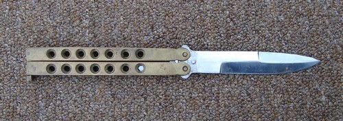 This Balisong knife has a 4-inch long blade and belonged to a Seawolf Door Gunner.