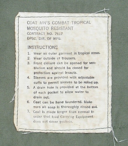 Nomenclature, contract and instruction label from the Mosquito Resistant Tropical Combat Jacket.