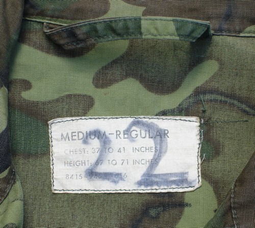 As with all previous designs, the third pattern Tropical Combat Coat had a hanger loop.