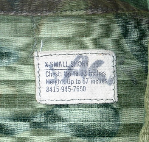 The 4th pattern Tropical Combat Coat was the first version not to have a hanger loop.