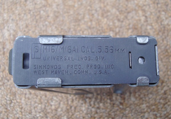 Manufacturer's stamp on the bottom of a 20-round M16 magazine.
