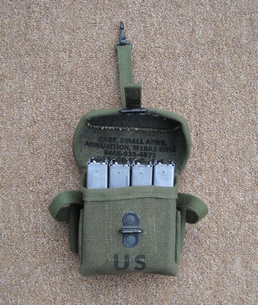 The cotton M16A1 ammunition case could hold up to four 20rd magazines for the M16 / M16A1 rifle.