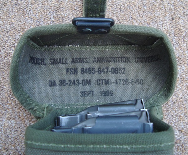 The first pattern M1956 Universal Ammunition Case could only accommodate two M14 magazines.