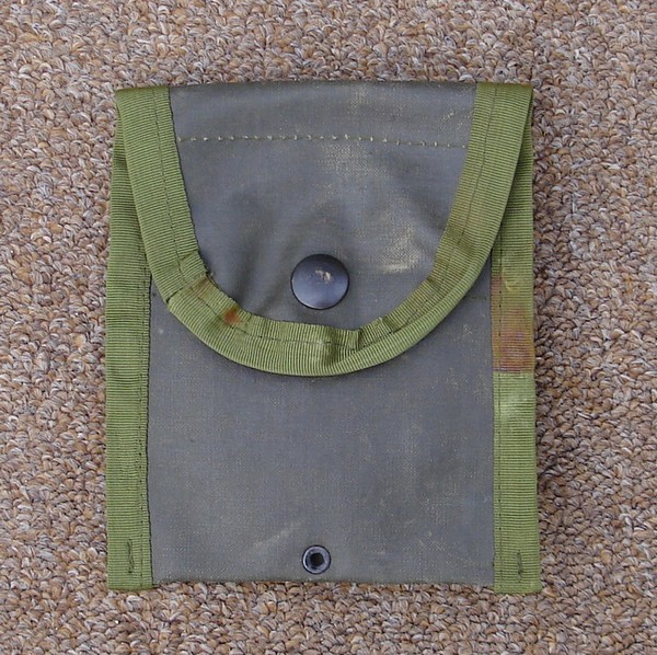 Rubberized version of the M1967 First Aid / Compass pouch.