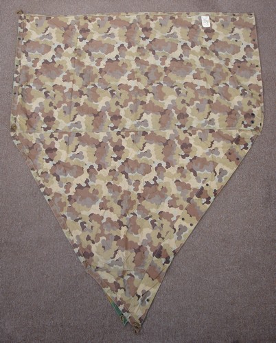 Brown cloud shapes were used on the underside of the reversible Mitchell pattern camouflage.