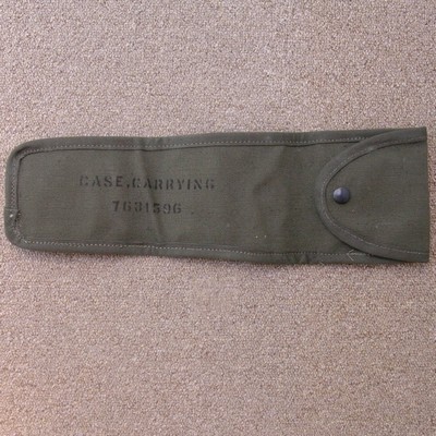 The M1 Rifle Scope Pouch was made from cotton duck and was closed by a single snap fastener.