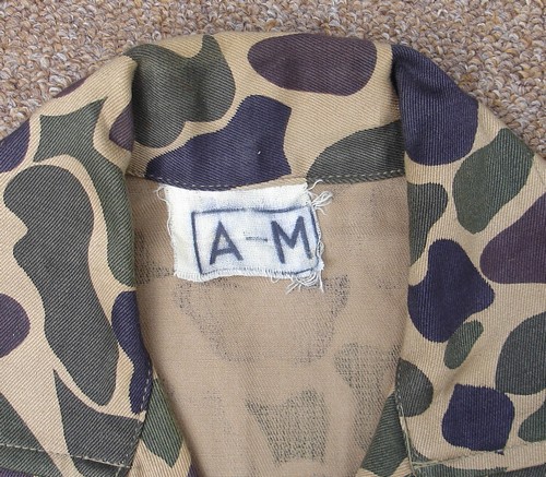 Spot camouflage shirt size label.