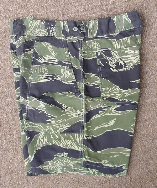 Made from a pair of John Wayne Dense (JWD) tiger stripe trousers, these shorts feature an adjustable waistband.