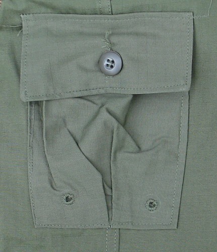 The left thigh cargo pocket on  all Tropical Combat Trousers contained a smaller inner pocket that was originally designed to hold a survival kit.