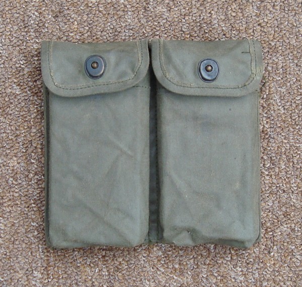 The M16 ammunition pouch was made from rubberized cotton duck and was issued to members (3 per individual) of the 1041st Security Police Squadron.