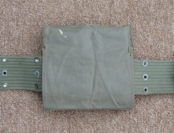 A belt could simply be threaded through the back of the M16 Ammunition Pocket.